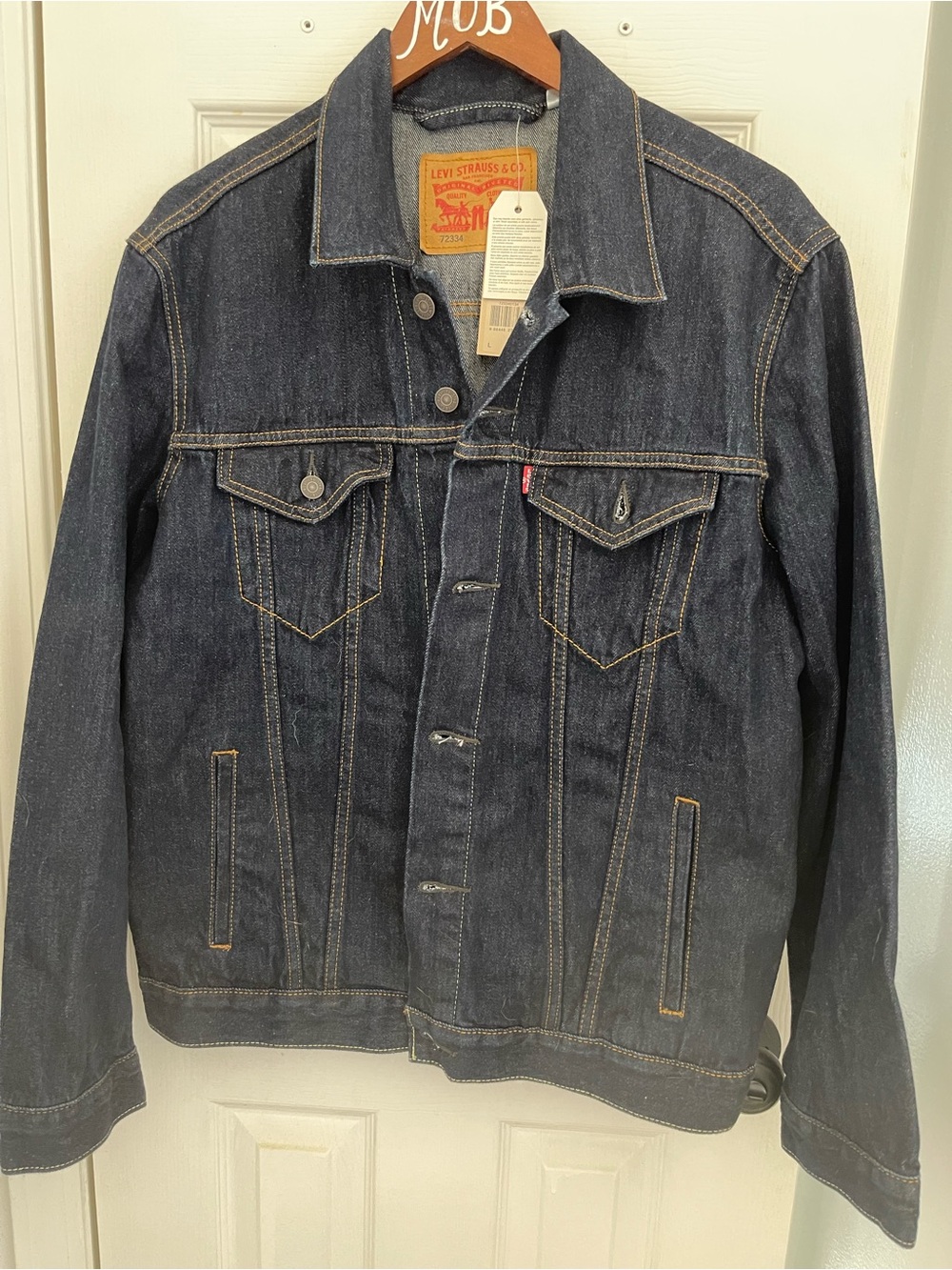 Levi's Dark Blue Denim Trucker Jacket with Contrast Stitching